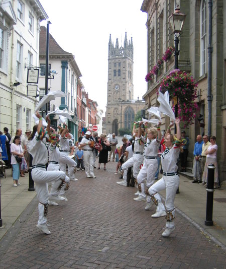 Dancers leaping into line